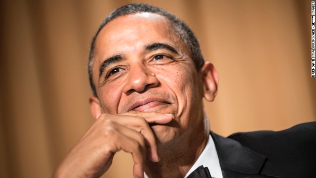 President Obama smiles during the dinner. 