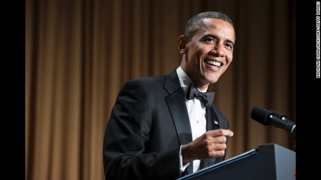 Obama smiles while during his speech.