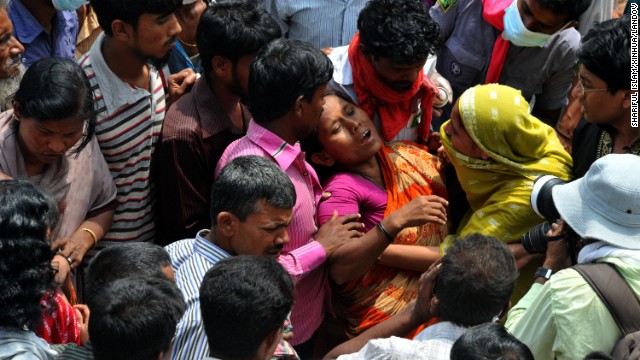 A woman mourns on Sunday, April 28, at the site of a building that collapsed in Savar, Bangladesh, outside the capital, Dhaka. Authorities are still working to remove injured people and bodies from the ruins of the building, which housed garment factories and shops. <a href='http://www.cnn.com/2013/04/28/world/asia/bangladesh-building-collapse/index.html'>The death toll stands at more than 370 </a>after the building collapsed Wednesday, April 24.