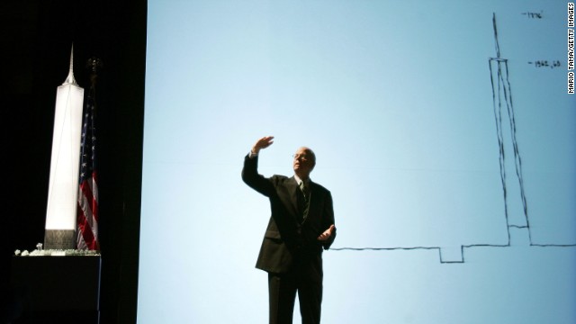 Architect David Childs speaks beside a model design of the Freedom Tower on June 28, 2005, in New York.