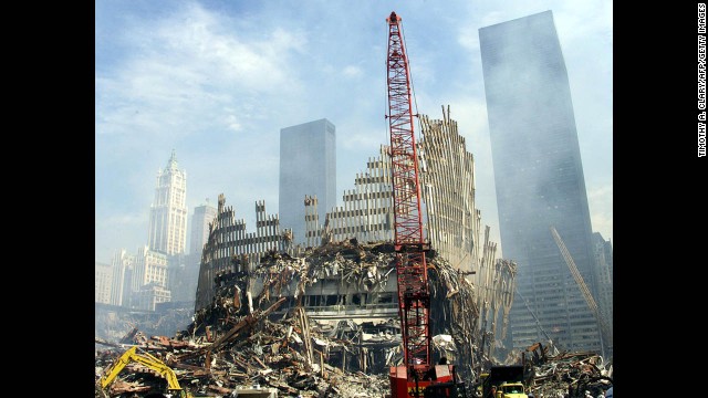 A crane works on the remains of one of the twin towers on September 18, 2001.