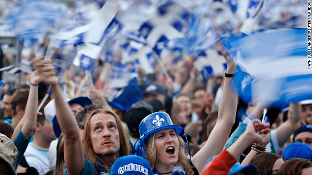 Revelers celebrate St. Jean Baptiste Day on the Plains of Abraham in Quebec City. There's a strong nationalistic component to the holiday, especially for the current minority who believe Quebec should be its own country.