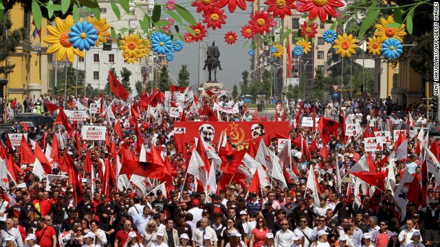 Supporters of the nationalist party Red and Black march in Tirana, Albania during a May Day protest demanding the resignation of Premier Sali Berisha.