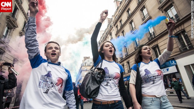 Hundreds of supporters of Marine Le Pen, leader of France's far-right National Front party, took to the streets on May Day Wednesday as part of the day's celebrations in images captured by iReporter Batareykin.