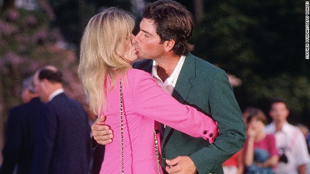 Sealed with a kiss. Fred Couples celebrates his one and only major success at the 1992 Masters with his wife Debbie. 