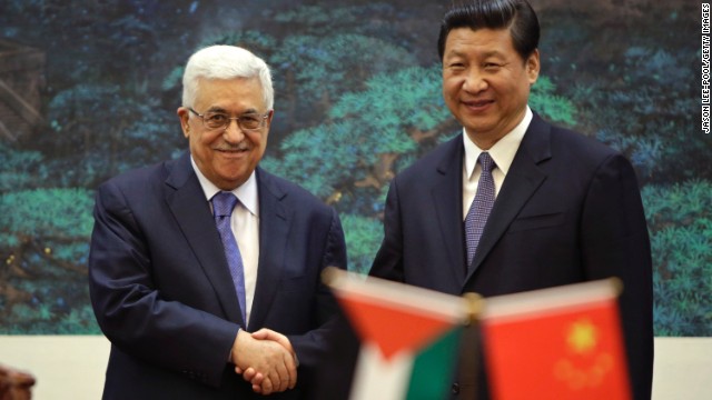 Palestinian Authority President Mahmoud Abbas shakes hands with Chinese President Xi Jinping on May 6, 2013.