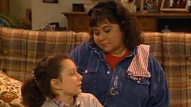 Roseanne was the outspoken and straight-shooting leader of the Connor family on the sitcom that bears her name. She could be crass as she tended to her kids D.J., Becky and Darlene (portrayed by Sara Gilbert, seen here), but that was also a big part of her charm. 