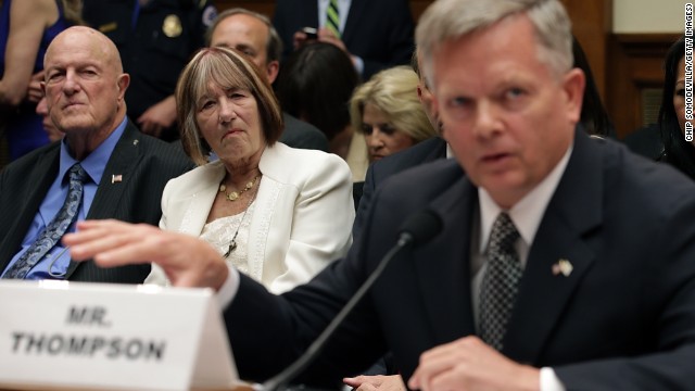 Ray Smith, left, and Pat Smith listen as Thompson testifies. Their son Sean was one of the four Americans killed in the terror attack.