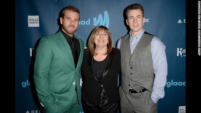 Scott Evans, left, and Chris Evans with their mother, Lisa Evans.