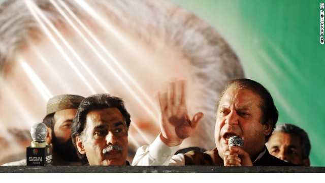 Former Pakistani Prime Minister Nawaz Sharif, right, speaks at a campaign closing rally in Lahore on May 9.