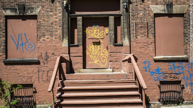 Around the corner from Seymour Avenue, graffiti is written on an abandoned building.