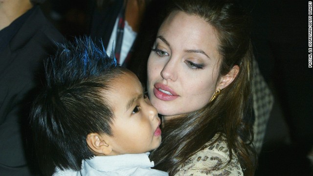  Jolie and her son Maddox at the world premiere of "Shark Tale" in September 2004 in Venice, Italy. 