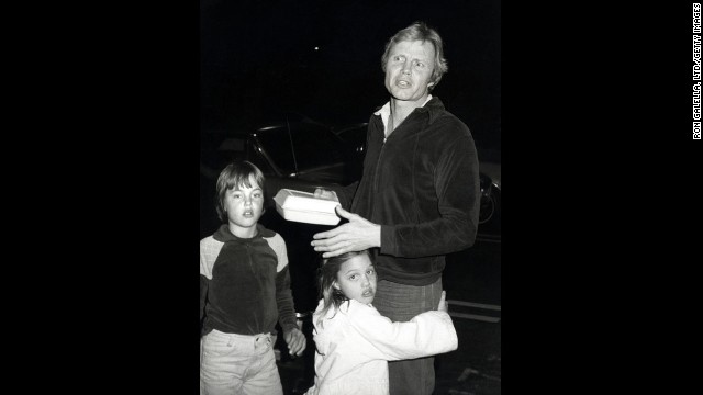 From left, Jolie's brother Jaime Haven Voight, Jolie, and her father Jon Voight in Los Angeles, January 1980.