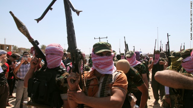 Iraqi anti-government gunmen from Sunni tribes in Anbar province march during a protest in Ramadi on April 26, 2013.