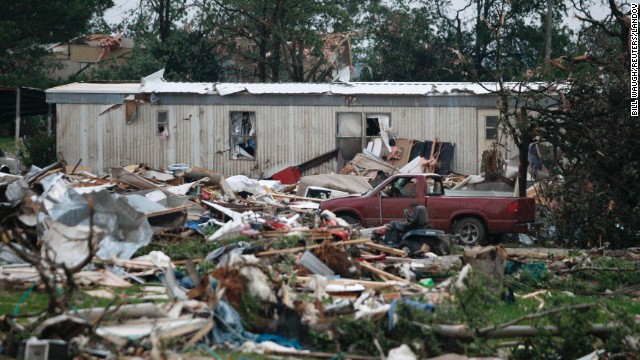 Debris from a mobile home park west of Shawnee litters the ground on May 19. An estimated 300 homes were damaged or destroyed across Oklahoma, Red Cross spokesman Ken Garcia said.