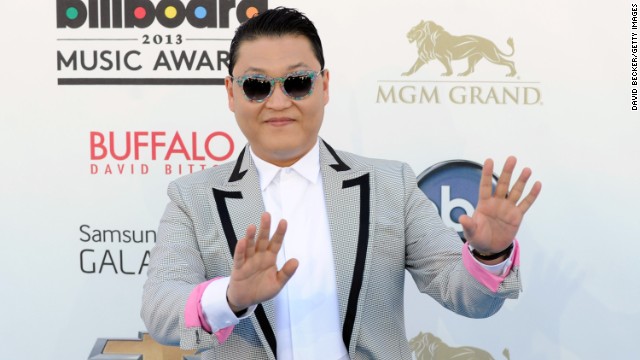 Psy arrives.