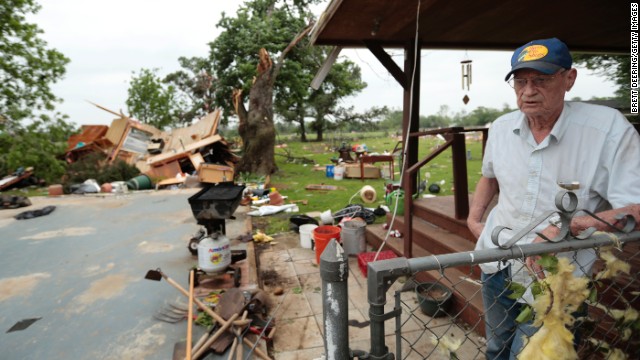 Lonnie Langston says his garage was swept off the concrete pad next to his house by a tornado near Shawnee, Oklahoma. 