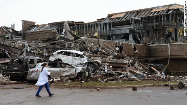 A nurse walks by the destruction at a Moore hospital on May 20.