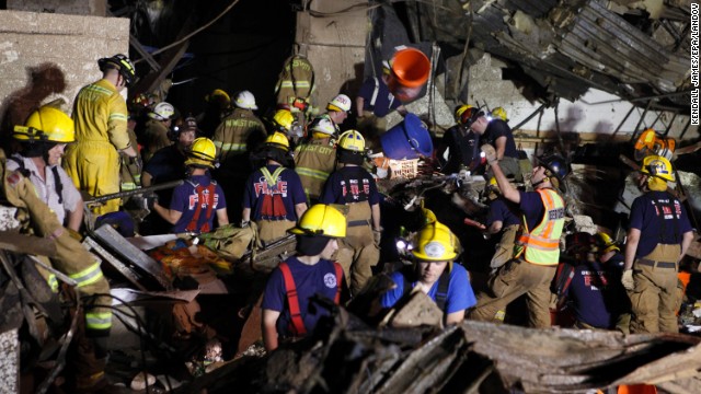 Members of the Oklahoma National Guard look for survivors in rubble in Moore on May 21.