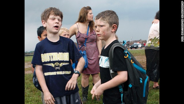 Children wait for their parents to arrive at Briarwood Elementary School in south Oklahoma City on May 20.