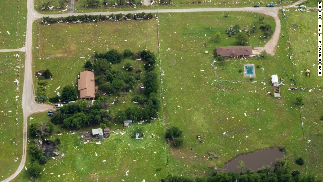 Debris from homes and structures was strewn for miles around. 