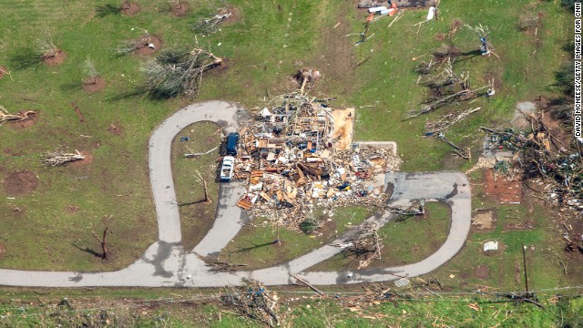 Police, firefighters, volunteers and nearly 180 National Guard troops joined forces Tuesday in searching the rubble and securing areas hit by the storm.