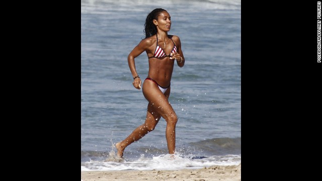 Jada Pinkett Smith shows off her athletic figure at the beach in Kauai, Hawaii, in November 2012.