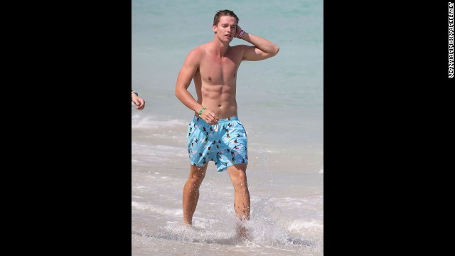 Patrick Schwarzenegger (son of Arnold and Maria) joined some friends in having a blast on the beach while on vacation in Miami in March.