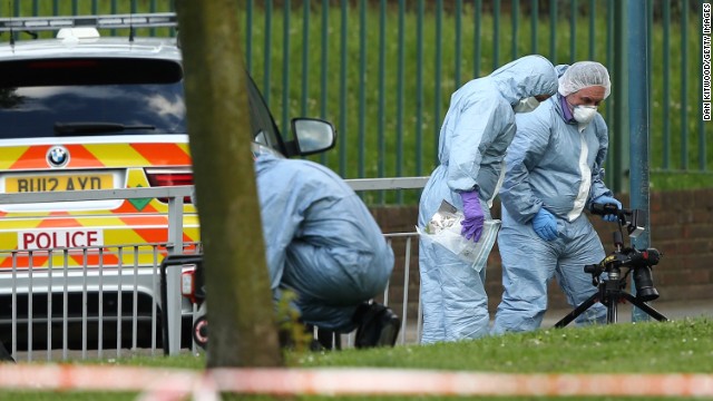 Crime officers examine the scene in Woolwich.