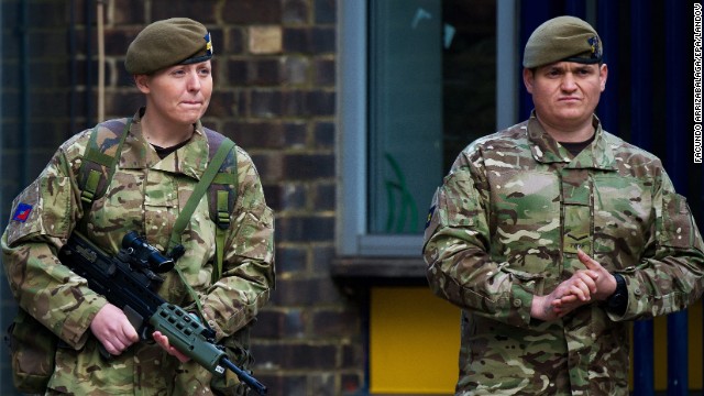 British soldiers stand guard outside the barracks on May 23.