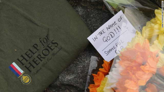 Notes and shirts sit outside Woolwich Barracks on May 23. The slain soldier was wearing a "Help for Heroes" shirt when he was killed. 