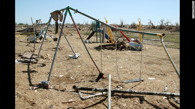 A swing set sits warped at Plaza Towers Elementary School on May 22. 