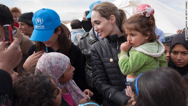 Jolie meets with refugees at the Zaatari refugee camp outside of Mafraq, Jordan, on December 6, 2012, in this handout image provided by UNHCR.