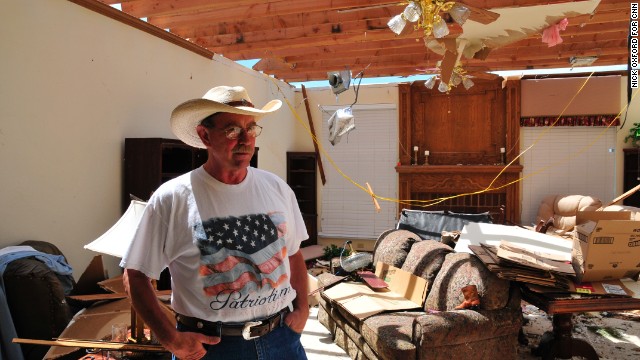 George Stanley recorded the tornado on his iPhone before waiting out the storm in his neighbor's underground storm shelter. He doesn't plan to leave. "It's my paradise out here," he said.