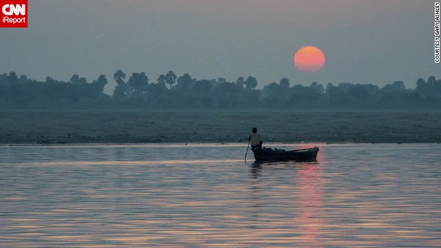 "Just for this moment, there was a tranquility that I have experienced nowhere else," says Gary Ashley of watching the sunrise from a rowboat on the <a href='http://ireport.cnn.com/docs/DOC-953637'>Ganges</a>.