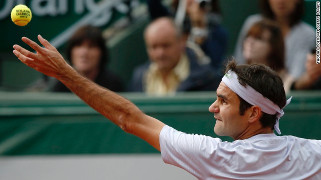 Switzerland's Roger Federer serves to India's Somdev Devvarman on May 29. Federer defeated Devvarman 6-2, 6-1, 6-1.