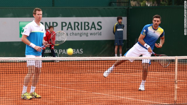 Jonathan Marray, left, and Colin Fleming of Great Britain play Feliciano Lopez of Spain and Andre Sa of Brazil on May 30.