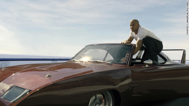 The good guys never, ever fall off that fast moving car. They will hold on by their fingertips, one hand or even leap from said vehicle. But, like Vin Diesel here in "Fast and Furious 6," they always stay perfectly perched.