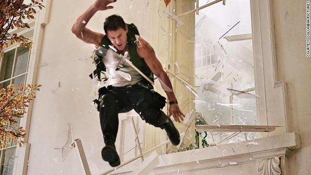 Don't try this one at home, folks. When the star jumps through a window there may be a scratch here and there but don't worry about them getting too cut up. Here Channing Tatum as John Cale takes a leap in '"White House Down."
