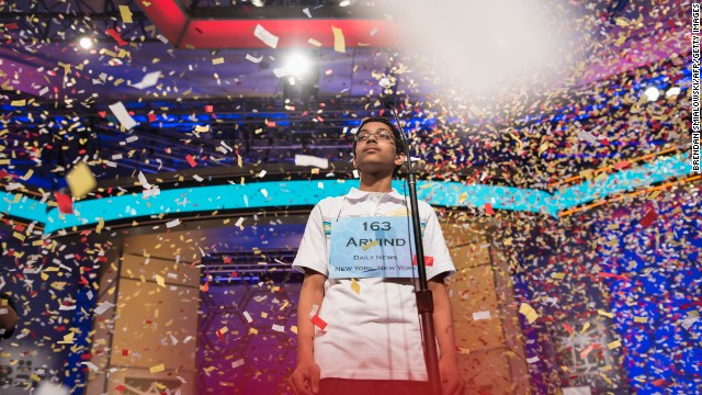 Confetti falls on Mahankali after he won the bee.