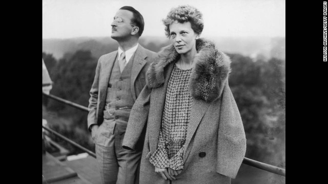 Earhart stands on the roof of the Hyde Park Hotel in London with Capt. Hilton H Railey on June 20,1928.