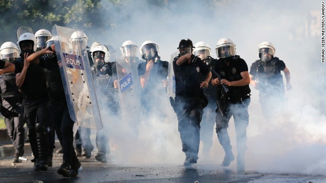Riot police use tear gas in an attempt to disperse the crowd of demonstrators on June 1. 