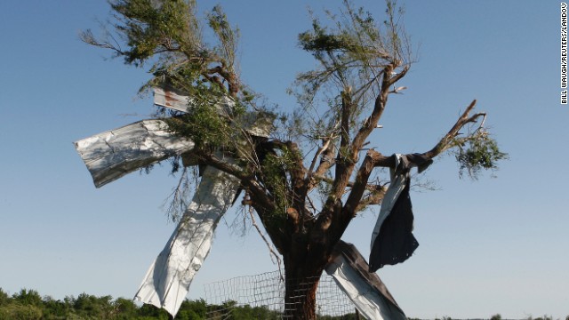 High winds left sheet metal wrapped around the branches of this tree along Route 66 in El Reno on June 1.