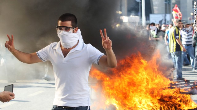 A protester flashes a victory sign as he takes part in a demonstration in Ankara on Saturday, June 1 in support of the protests in Istanbul against government plans to demolish a park. 