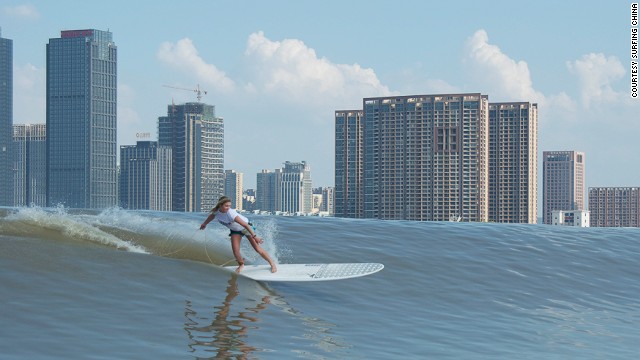 Each year, international surfers compete on Qiantang River, riding the "Silver Dragon" wave, which flows through the city of Hangzhou.