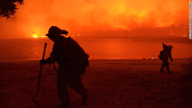 Firefighters battle the Powerhouse wildfire at the Angeles National Forest on Saturday, June 1. 