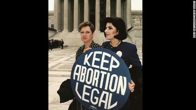 Roe v. Wade (1973): Norma McCorvey, identified as "Jane Roe," sued Dallas County District Attorney Henry Wade over a law that made it a felony to have an abortion unless the life of the mother was in danger. The court agreed with Roe and overruled any laws that made abortion illegal in the first trimester. Here, McCorvey, left, stands with her attorney Gloria Allred in 1989.