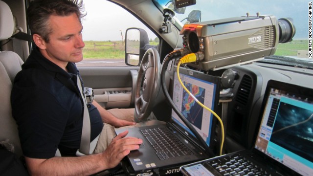 Carl Young, 45, reads data in a storm-chasing vehicle. He was a part of TWISTEX, the Tactical Weather Instrumented Sampling in Tornadoes Experiment, founded by Tim Samaras to help learn more about tornadoes and increase lead time for warnings.