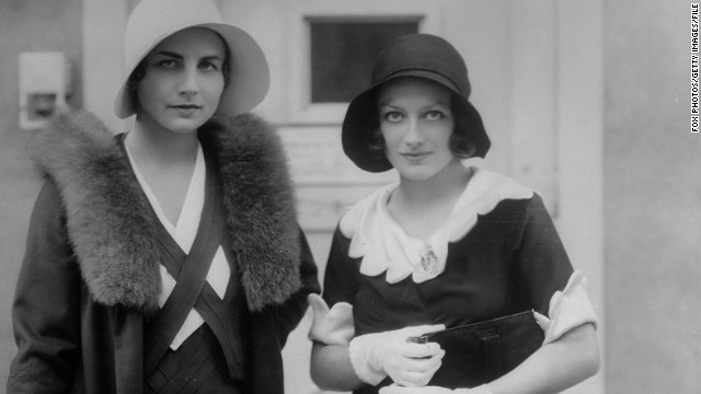 Lenglen's crown as the queen of women's tennis was taken by American Helen Wills Moody, pictured left with Hollywood actress Joan Crawford.