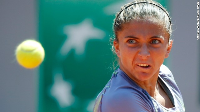 Sara Errani of Italy hits a return to Agnieszka Radwanska of Poland during a French Open quarter final match at the Roland Garros stadium in Paris on Tuesday, June 4. Sara defeated Agnieszka 6-4, 7-6 (6).